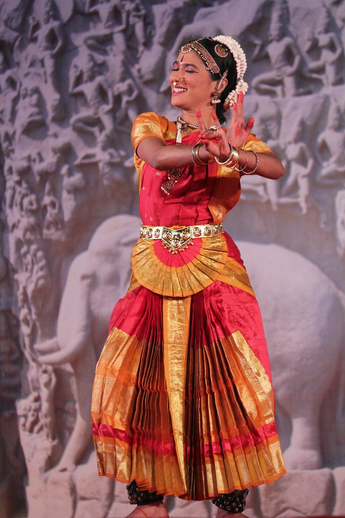 Bharatanatyam dancer mid-performance in a classical pose
