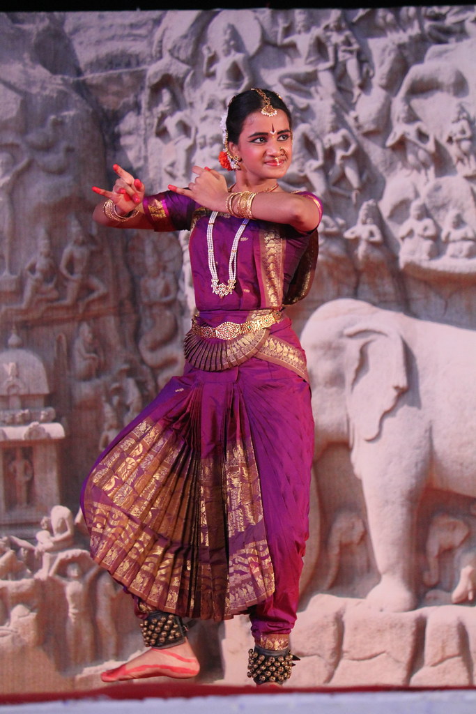 Dancers performing a group piece on stage