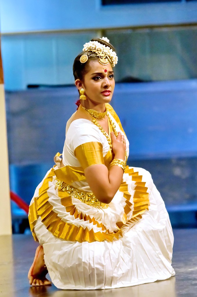 Mohiniyattam dancer performing with flowing expressions